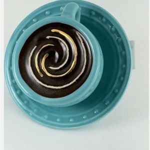 This Nora Fleming (pick) is used with platter, dishes and bowls  from NF brand